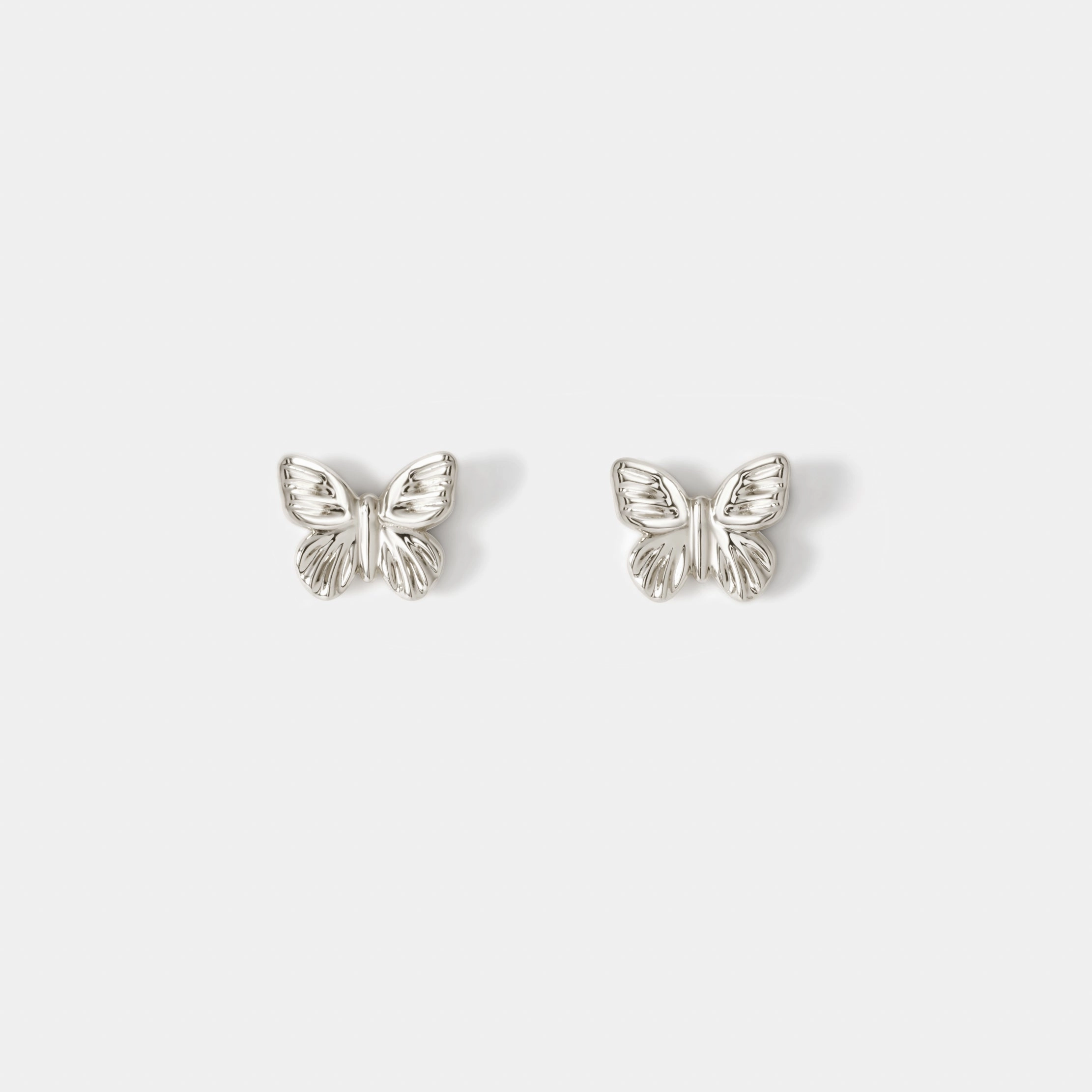Dull Accessory Linear Accent Butterfly Studs