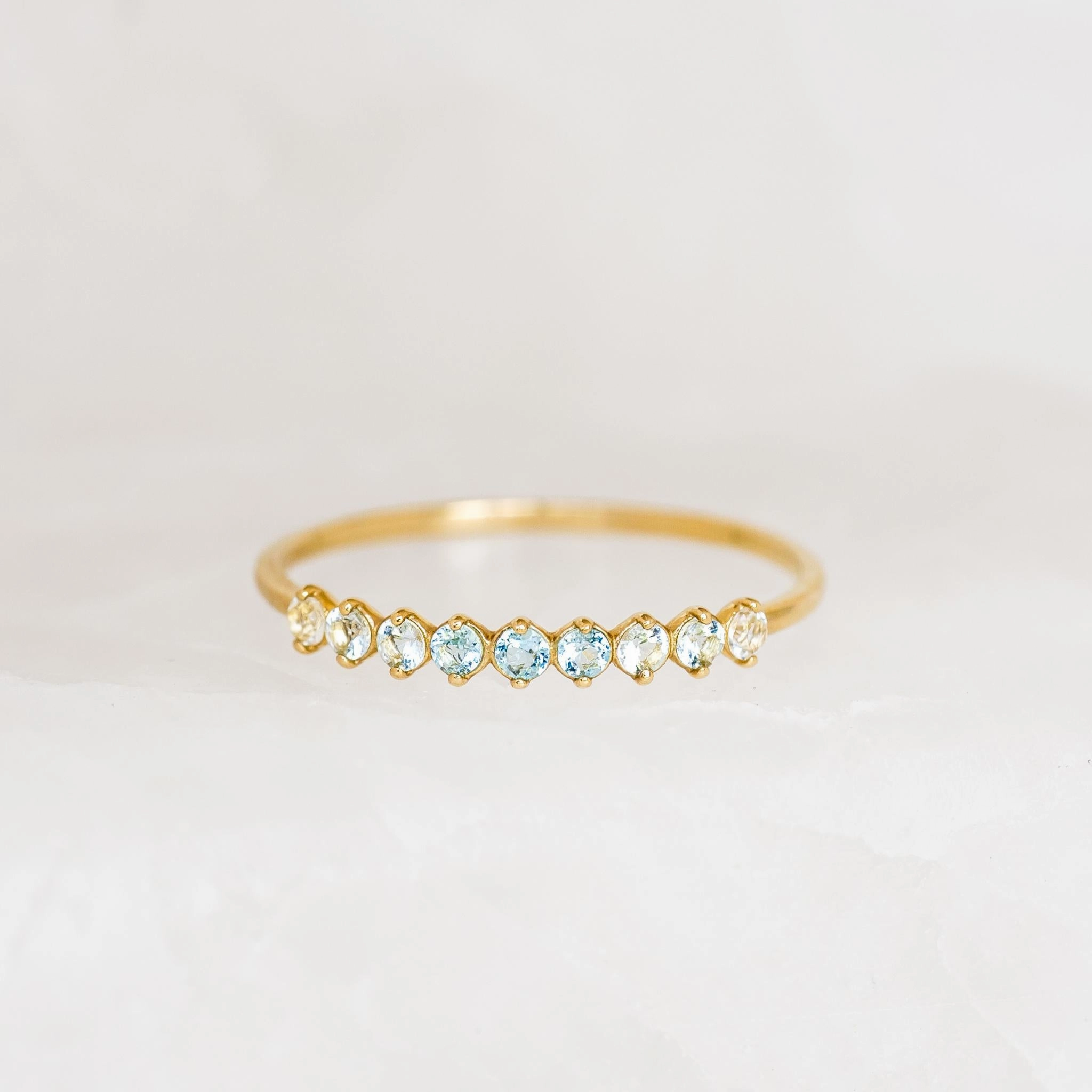 Traditional Symbol Designer Symbol March Birthstone Ring 14k Gold - Ombre Blue Topaz