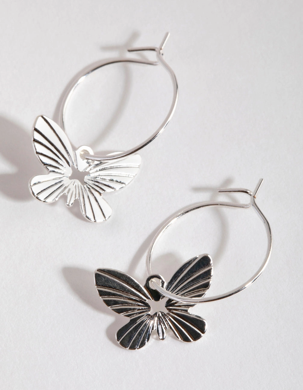 Light Feature Dazzling Feature Silver Butterfly Huggie Hoop Earrings