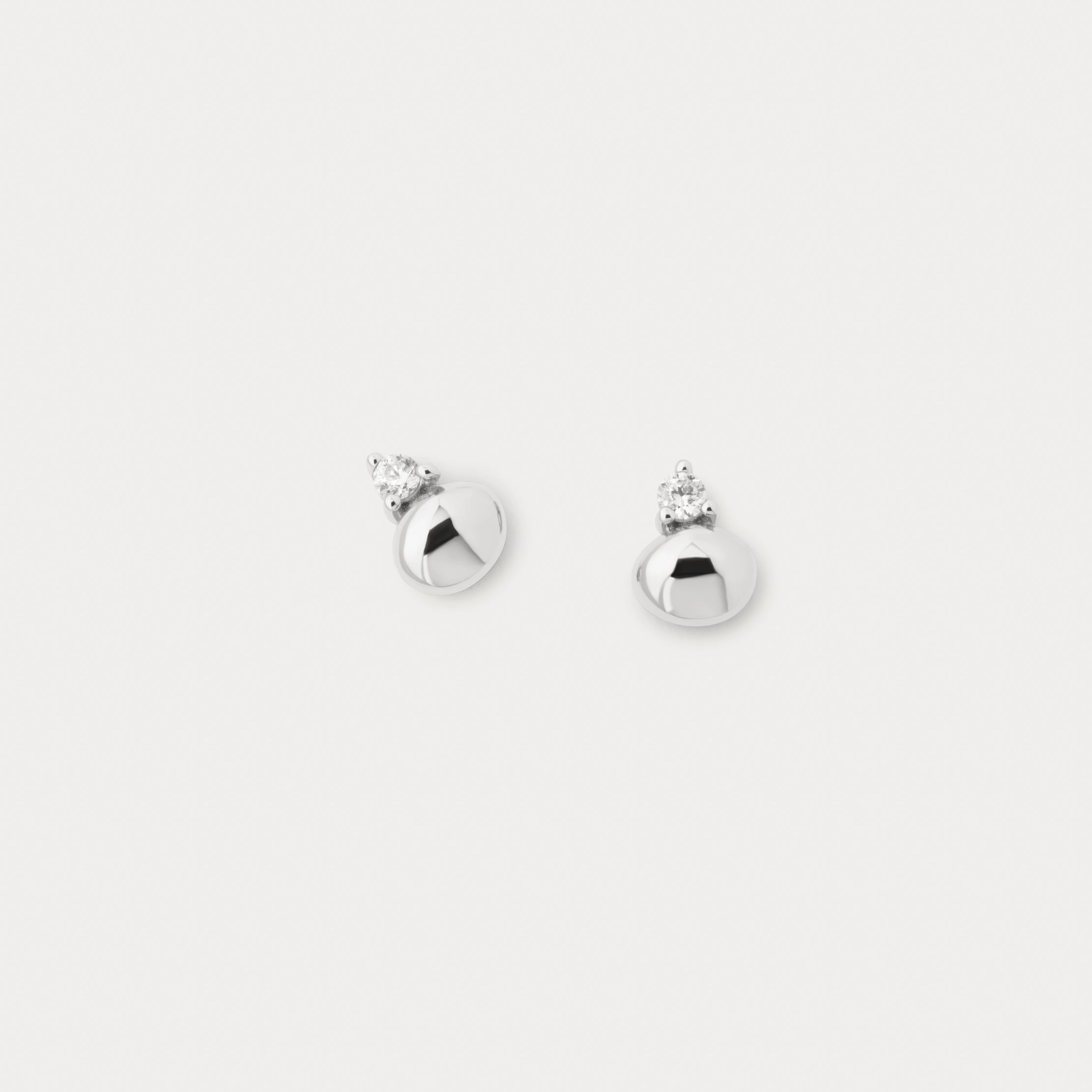 Gleaming Pebble Studs Sophisticated Look