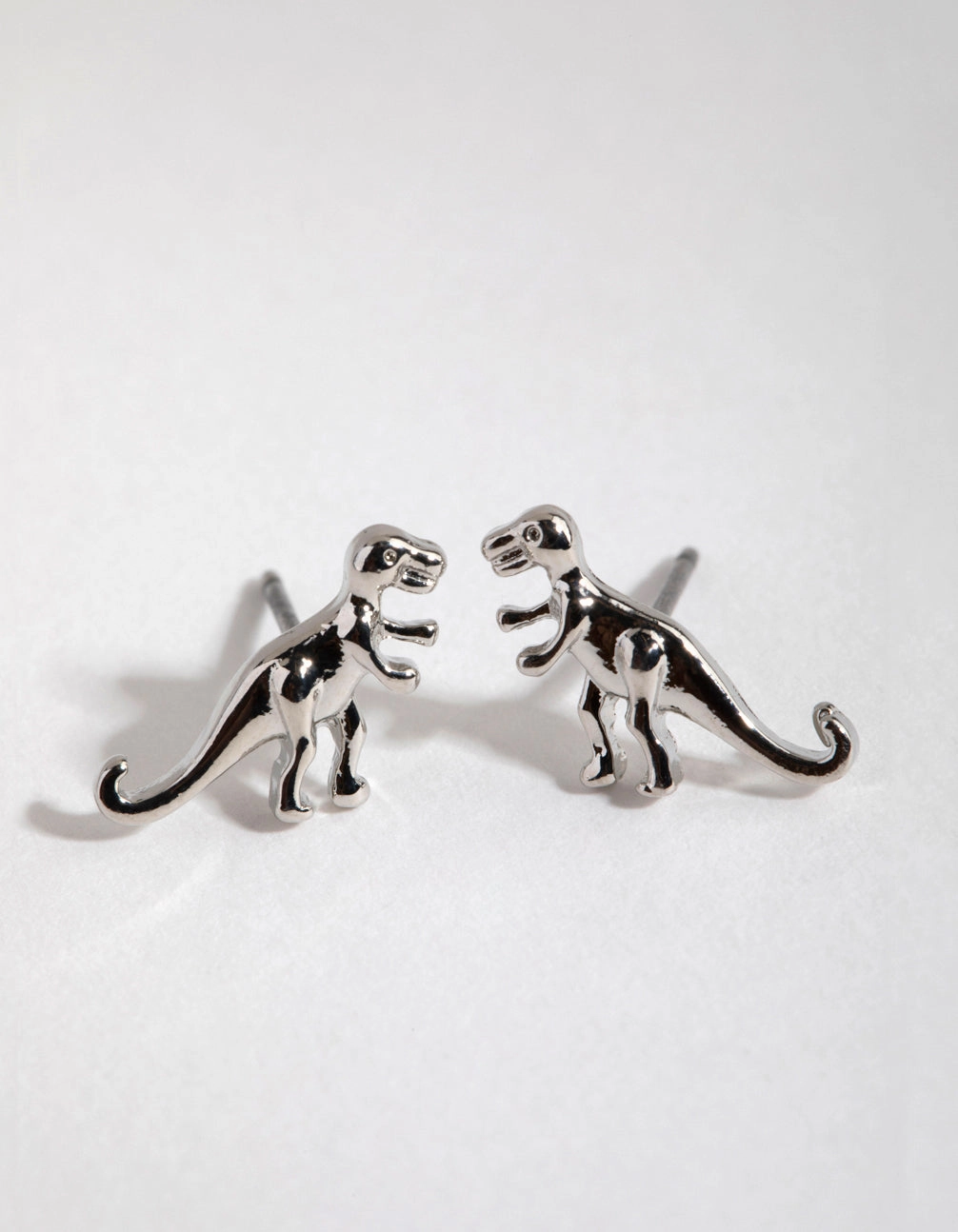 Silver T-Rex Stud Earrings Feminine Glow Distinct Accent